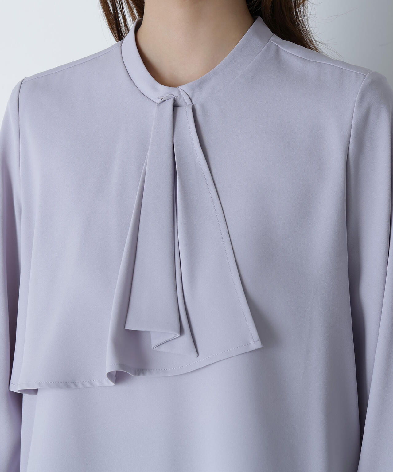 アシメラッフルボウブラウス