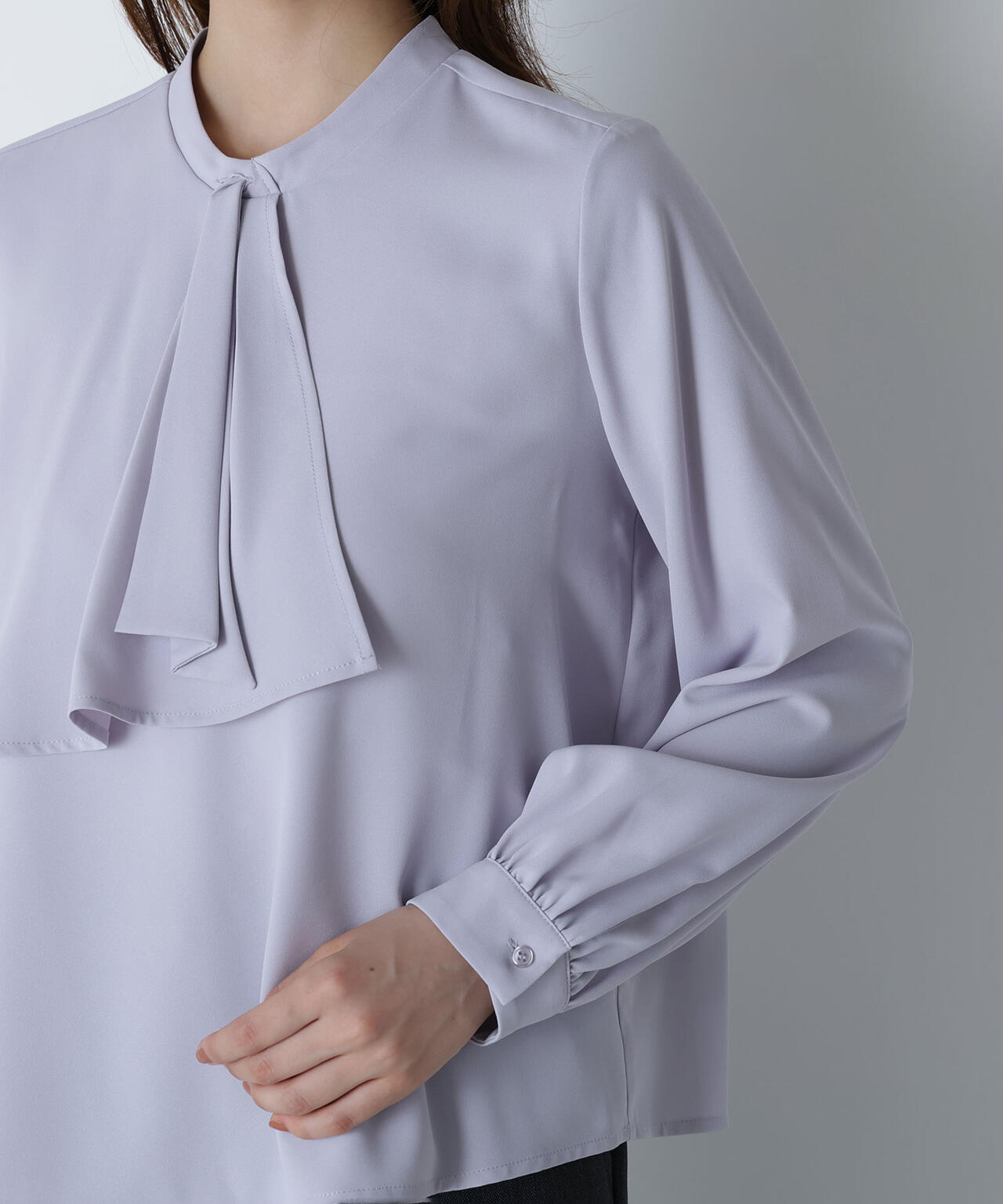 アシメラッフルボウブラウス