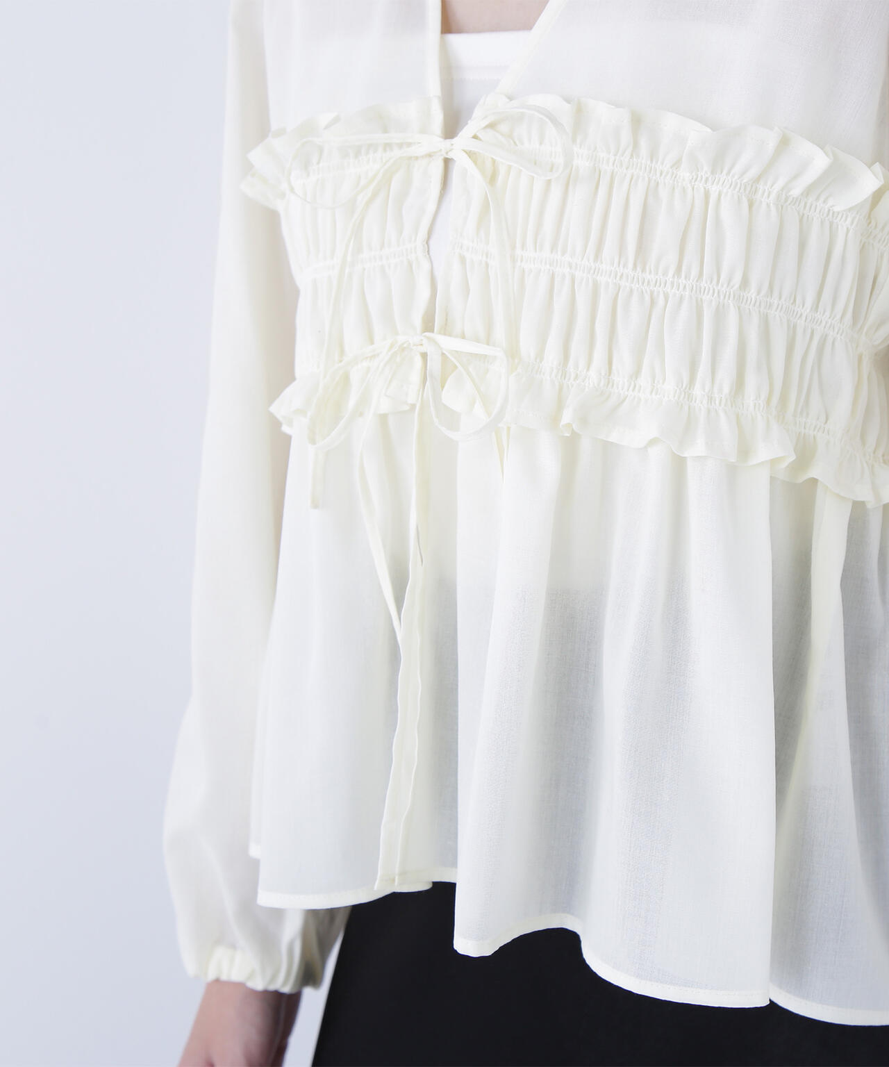 Vネックシャーリングペプラムブラウス