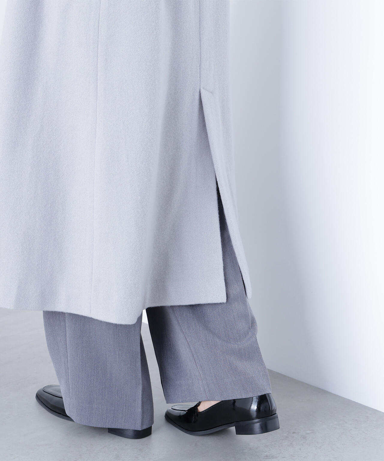 テーラーベルテッドロングコート