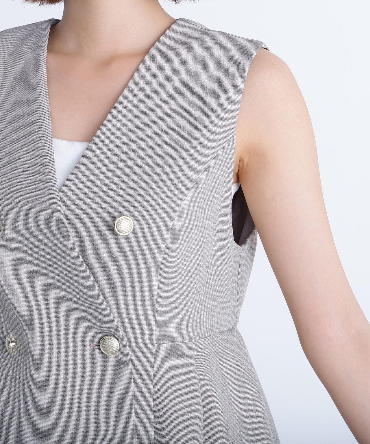 メタルボタンペプラムジレ