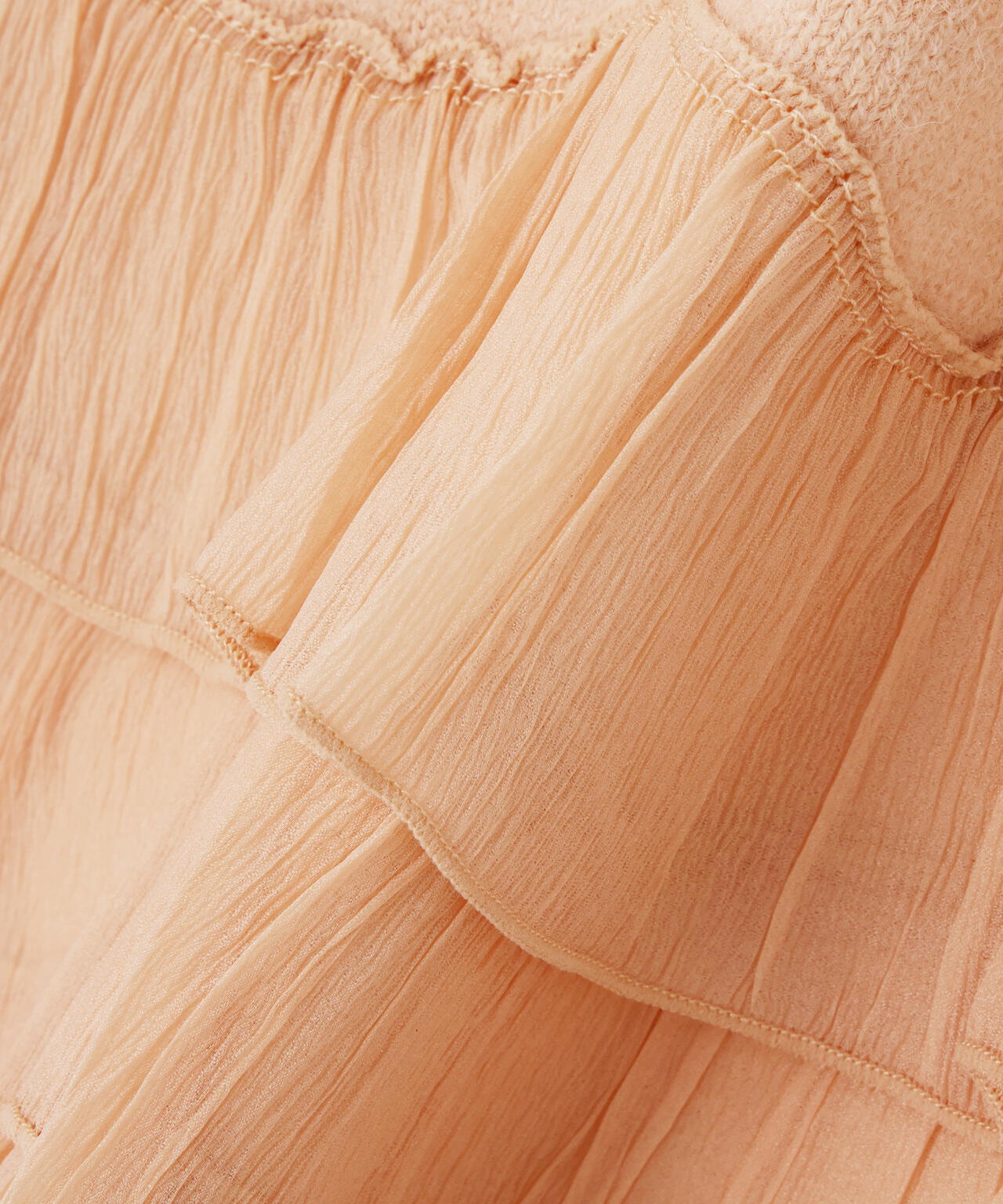 ヘムフリルドッキングニット