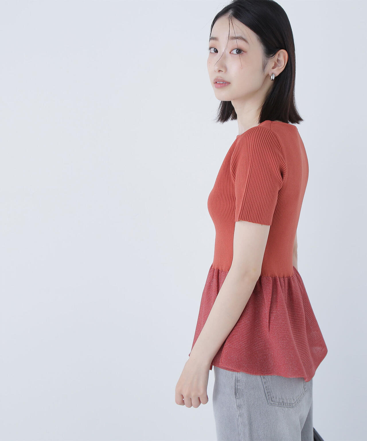 シアーペプラムフォルムニット