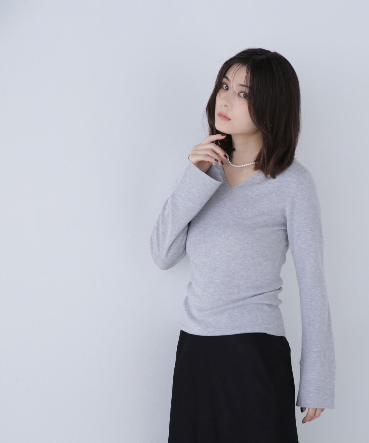 ニュアンスネックフレアスリーブニット