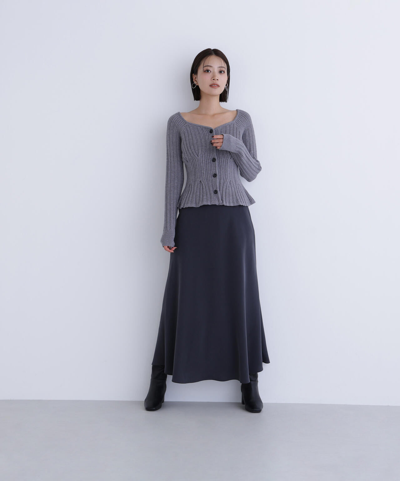 柄編みペプラムニットカーディガン