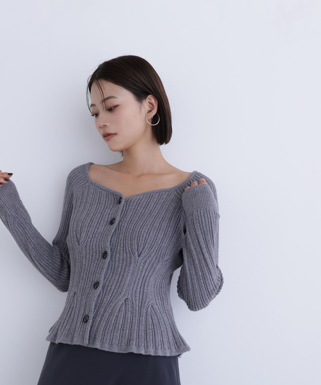 柄編みペプラムニットカーディガン