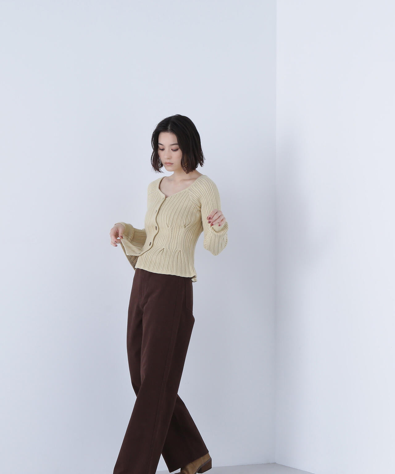 柄編みペプラムニットカーディガン