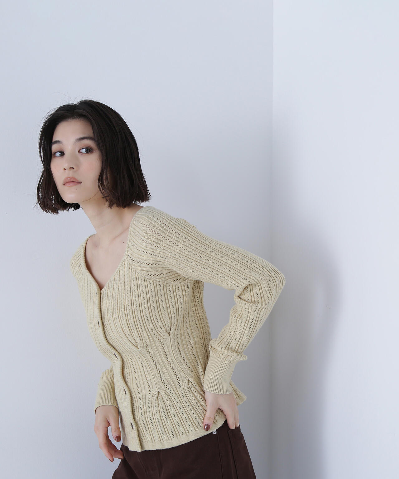 柄編みペプラムニットカーディガン