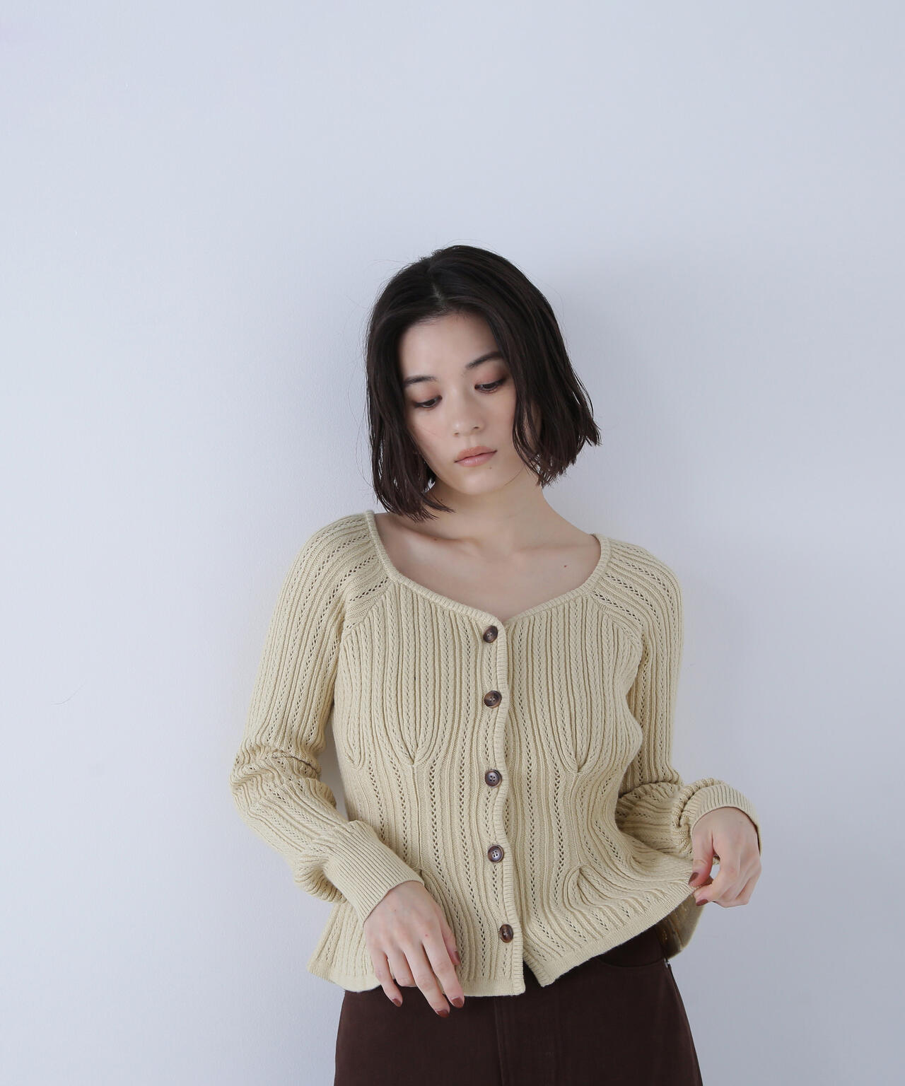 柄編みペプラムニットカーディガン