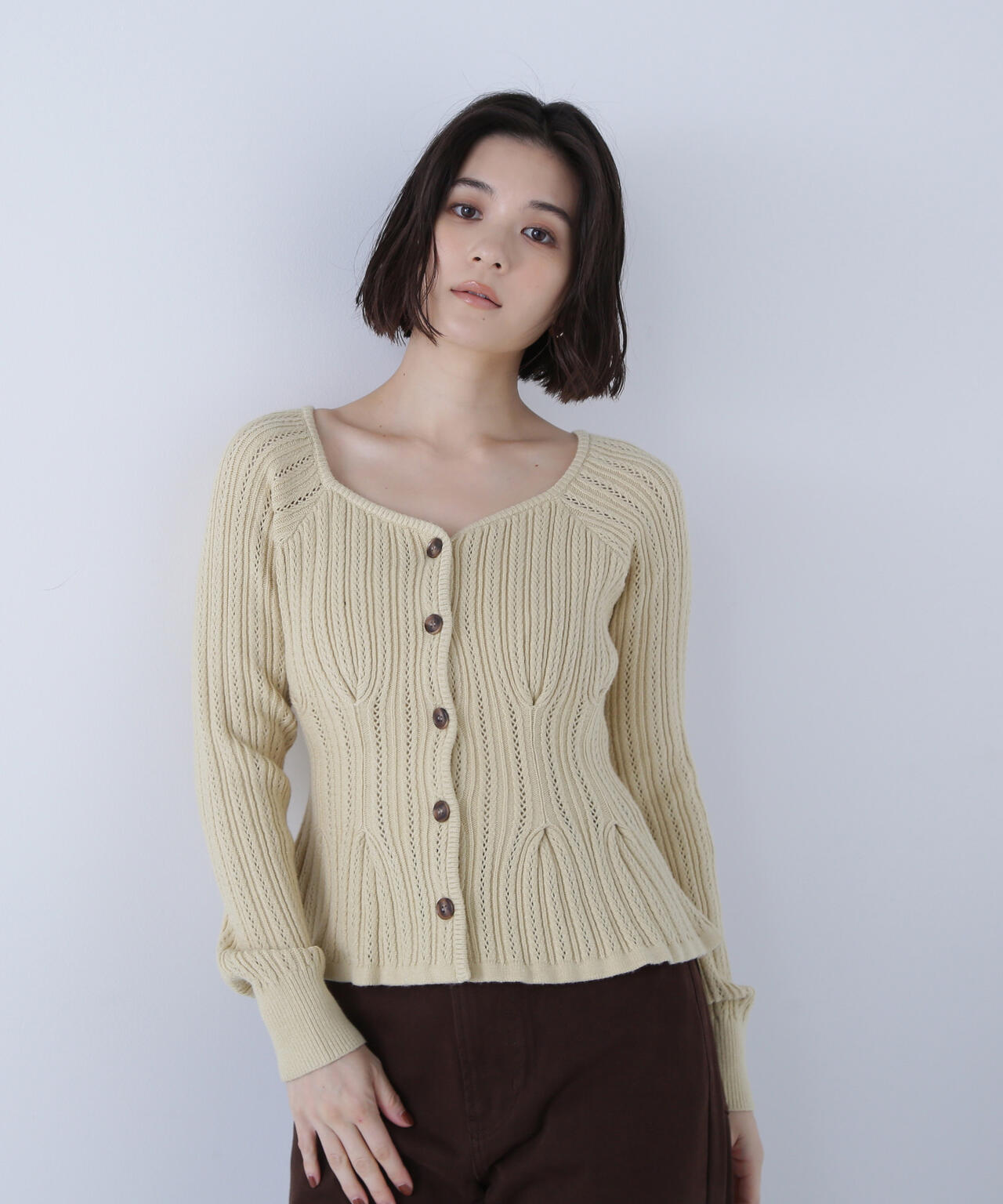 柄編みペプラムニットカーディガン