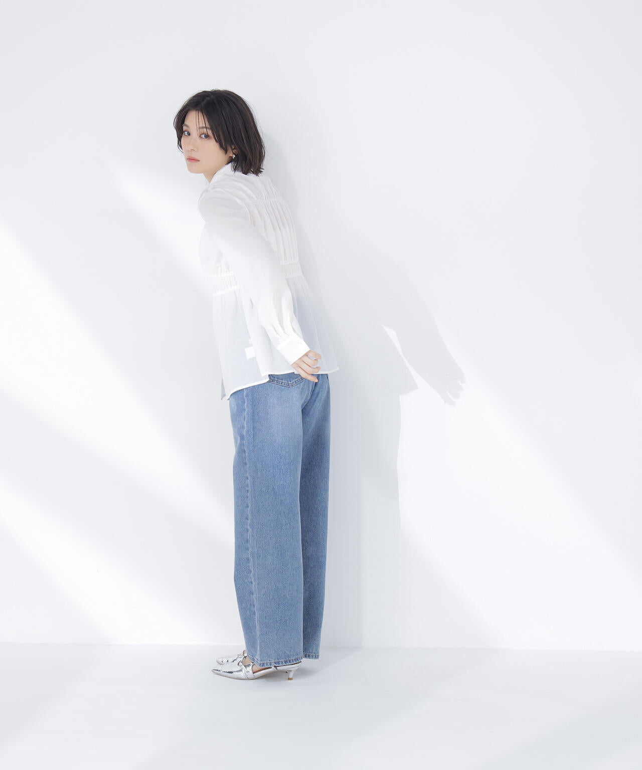 シャーリングペプラムシャツ