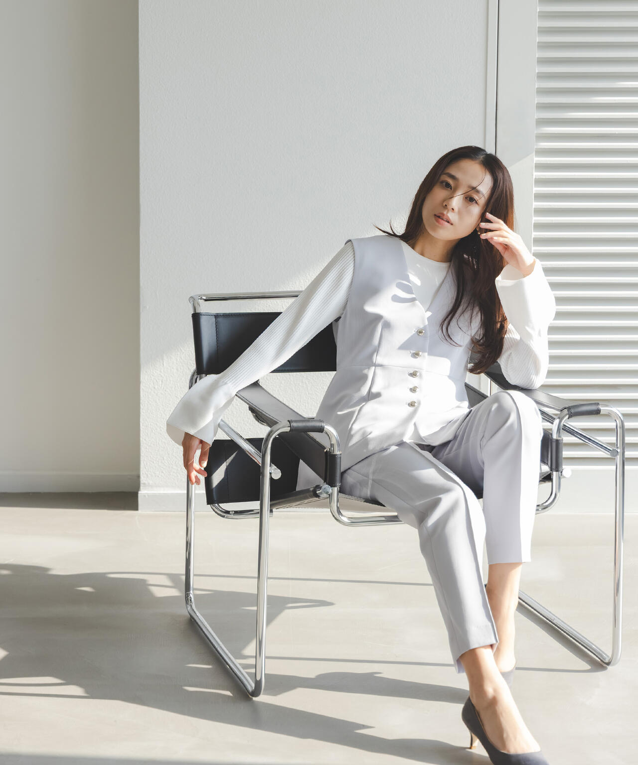 ベルスリーブペプラムニット