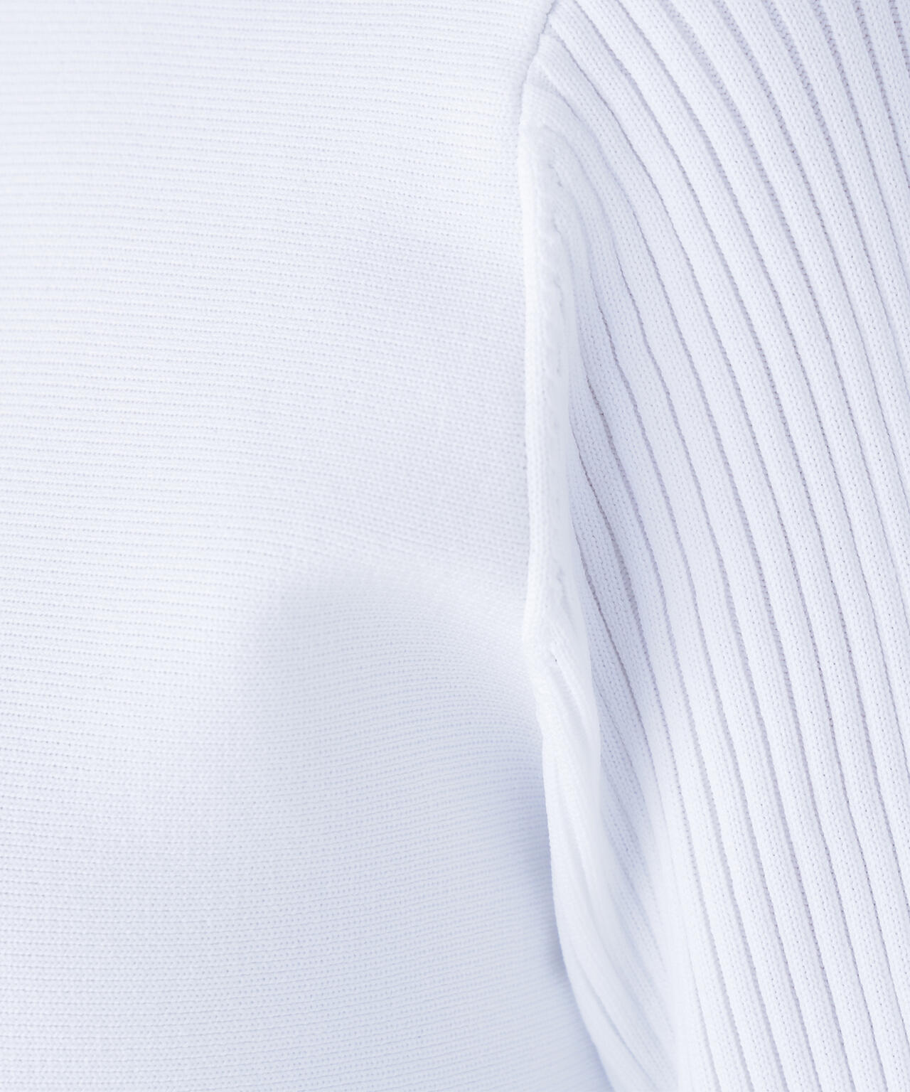 ベルスリーブペプラムニット