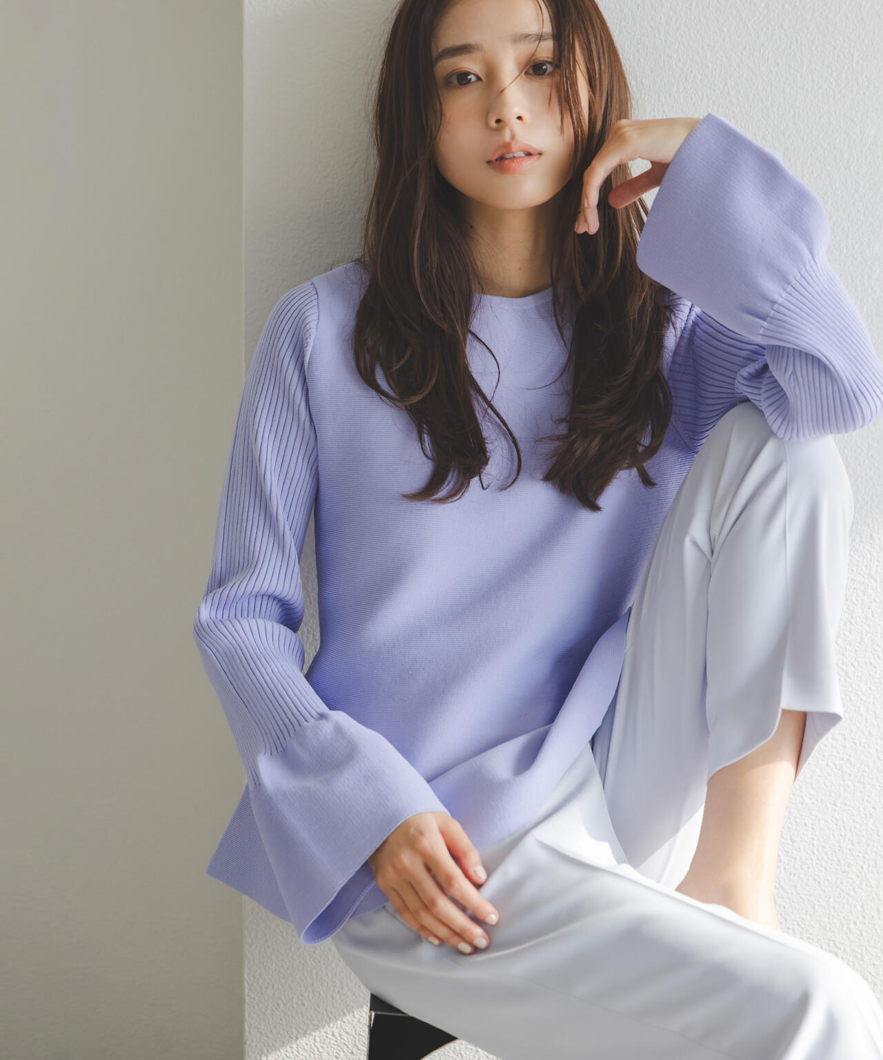 ベルスリーブペプラムニット