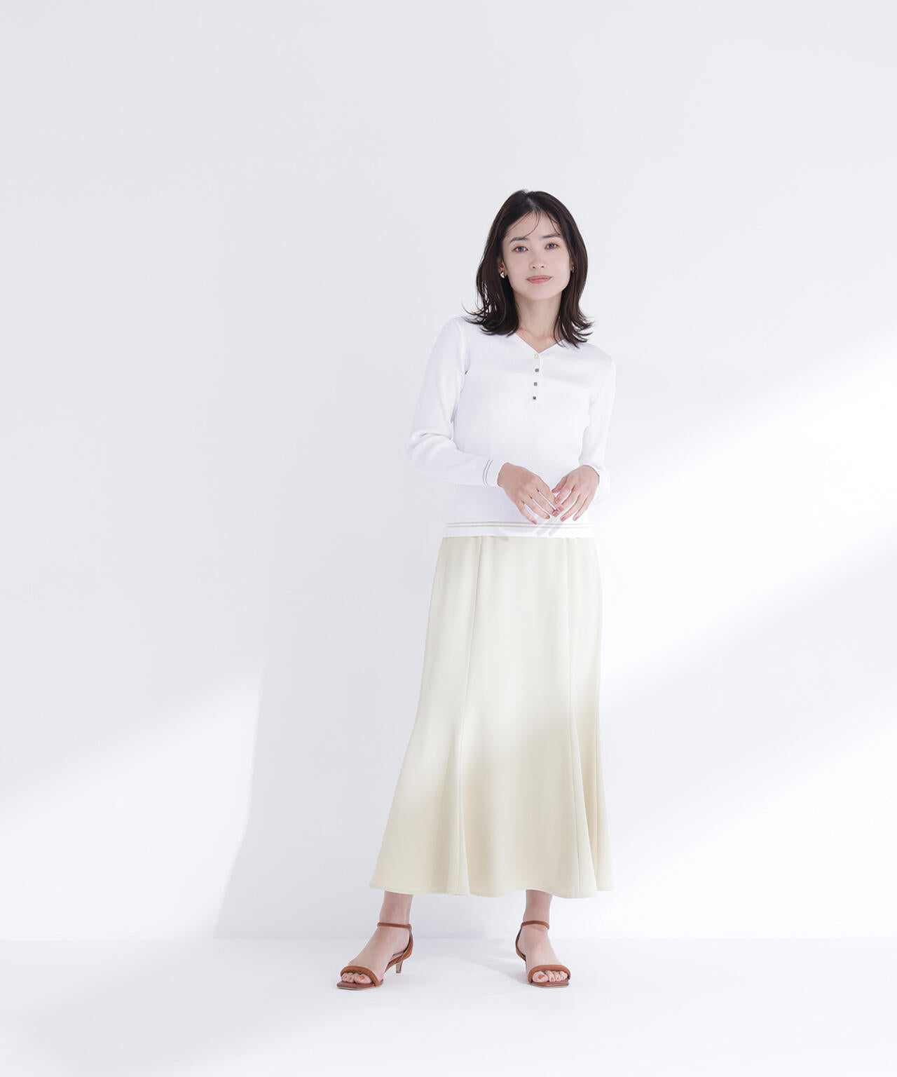 メタルボタンシアーラインニット