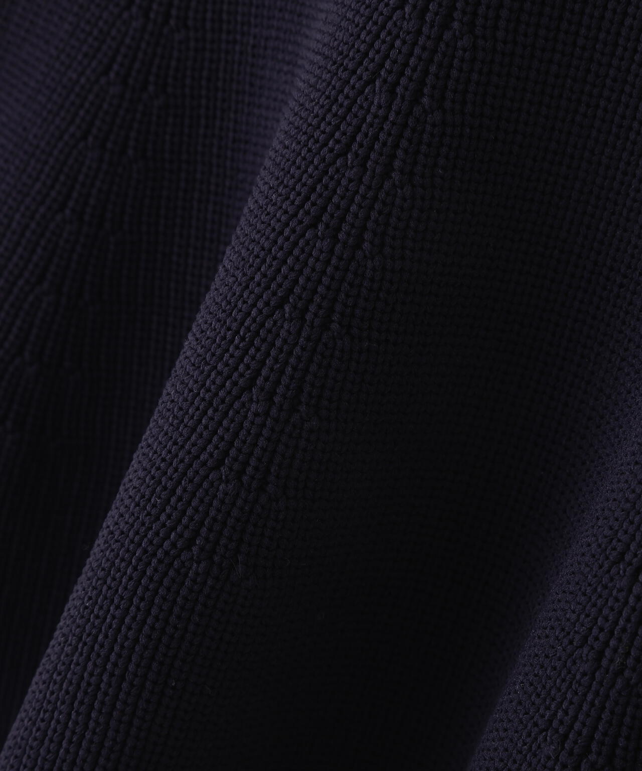 【ユーティリティ】前後で着られるペプラムフォルムニット