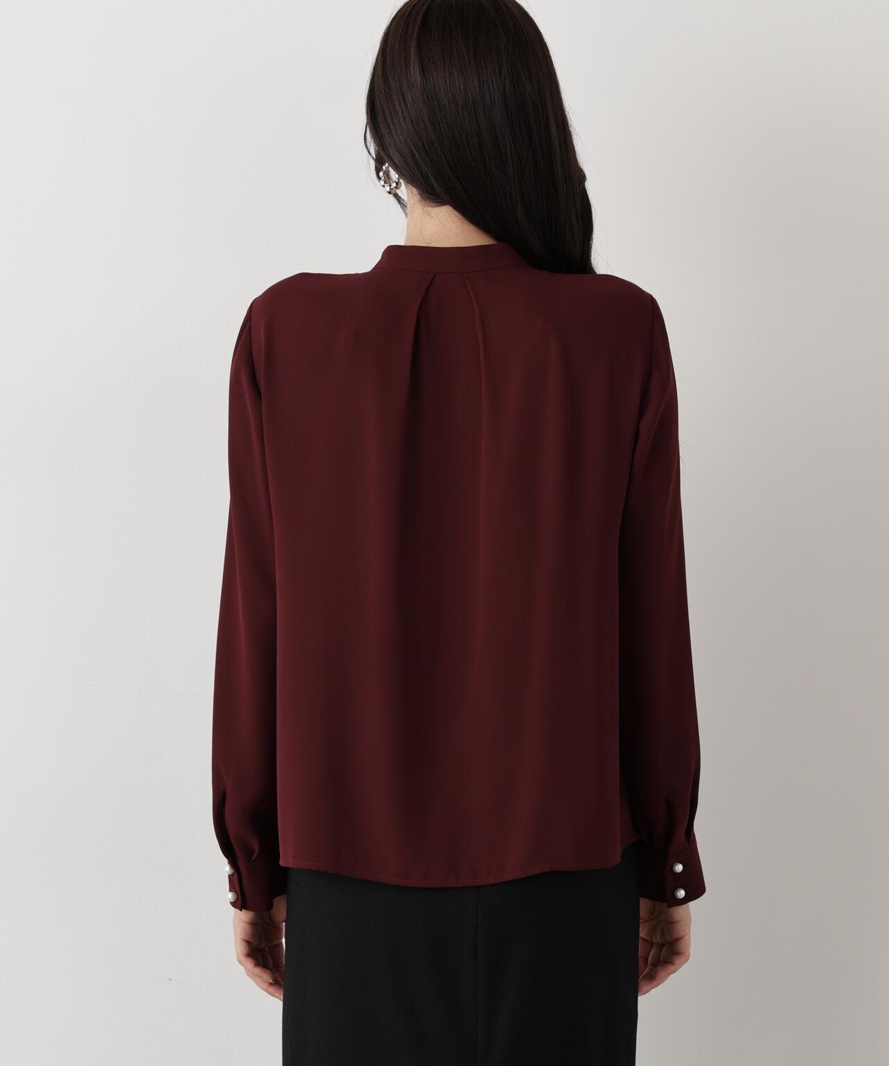 フロントラッフルパール釦ブラウス