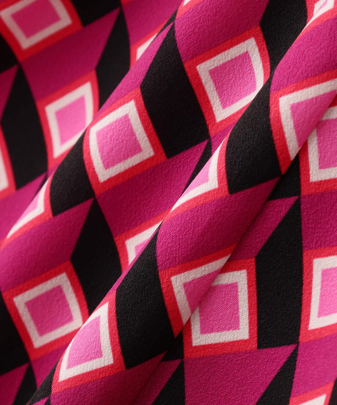 ジオメトリックプリントクロスリボンブラウス