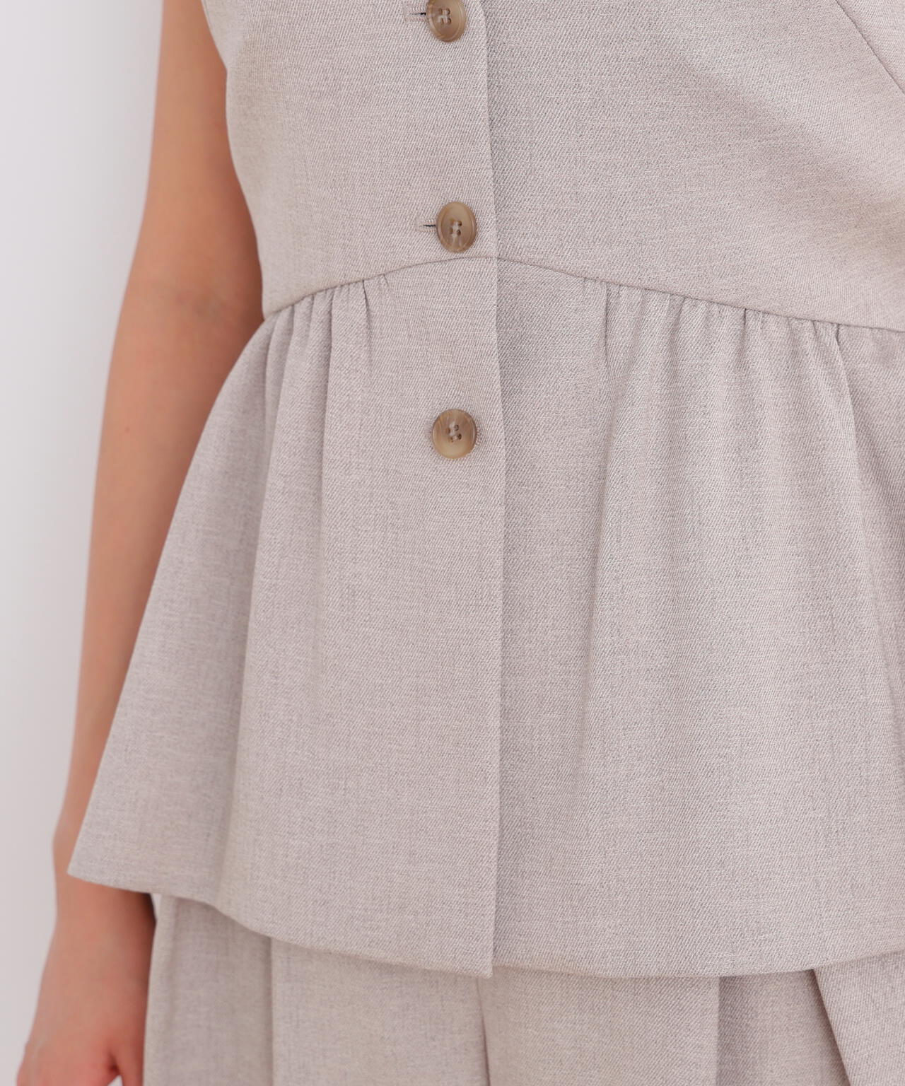 スラブ調ペプラムブラウス