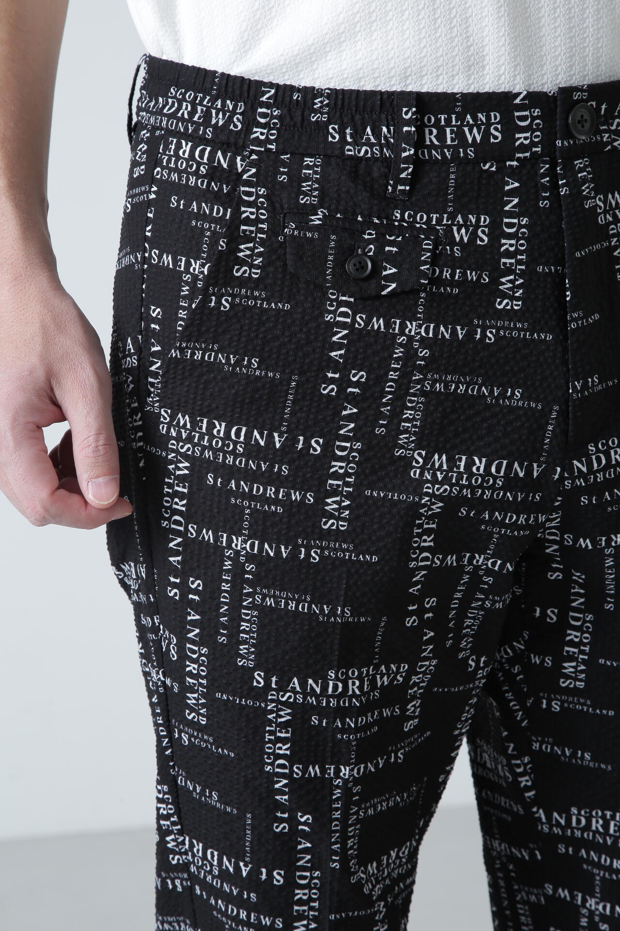 ランダムロゴプリントパンツ (MENS)