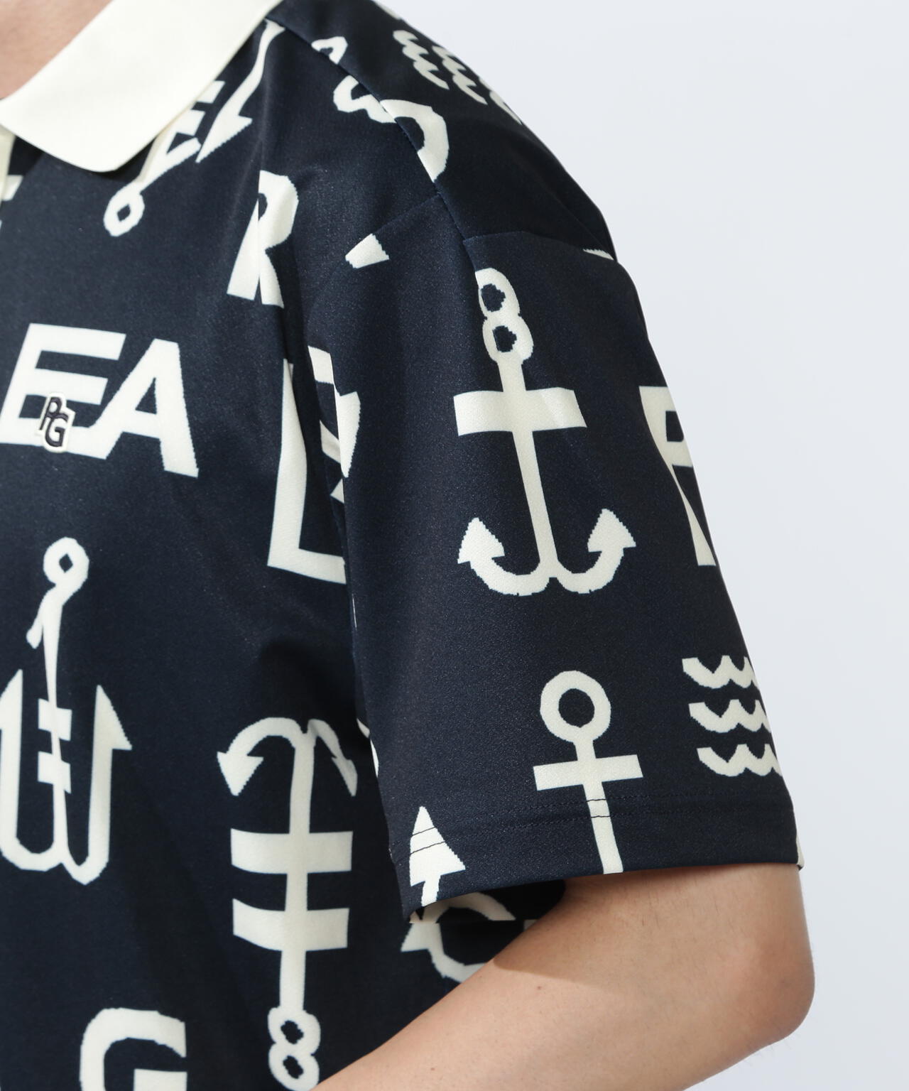 梨地半袖ポロシャツ <アンカーロゴ総柄>