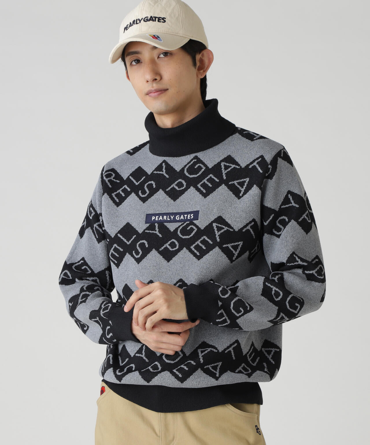 ダブルJQロゴギザボーダー柄タートルニットプルオーバー