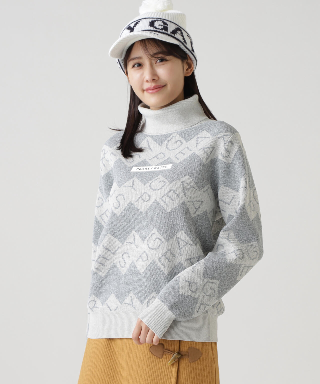 ダブルJQロゴギザボーダー柄タートルネックニットプルオーバー