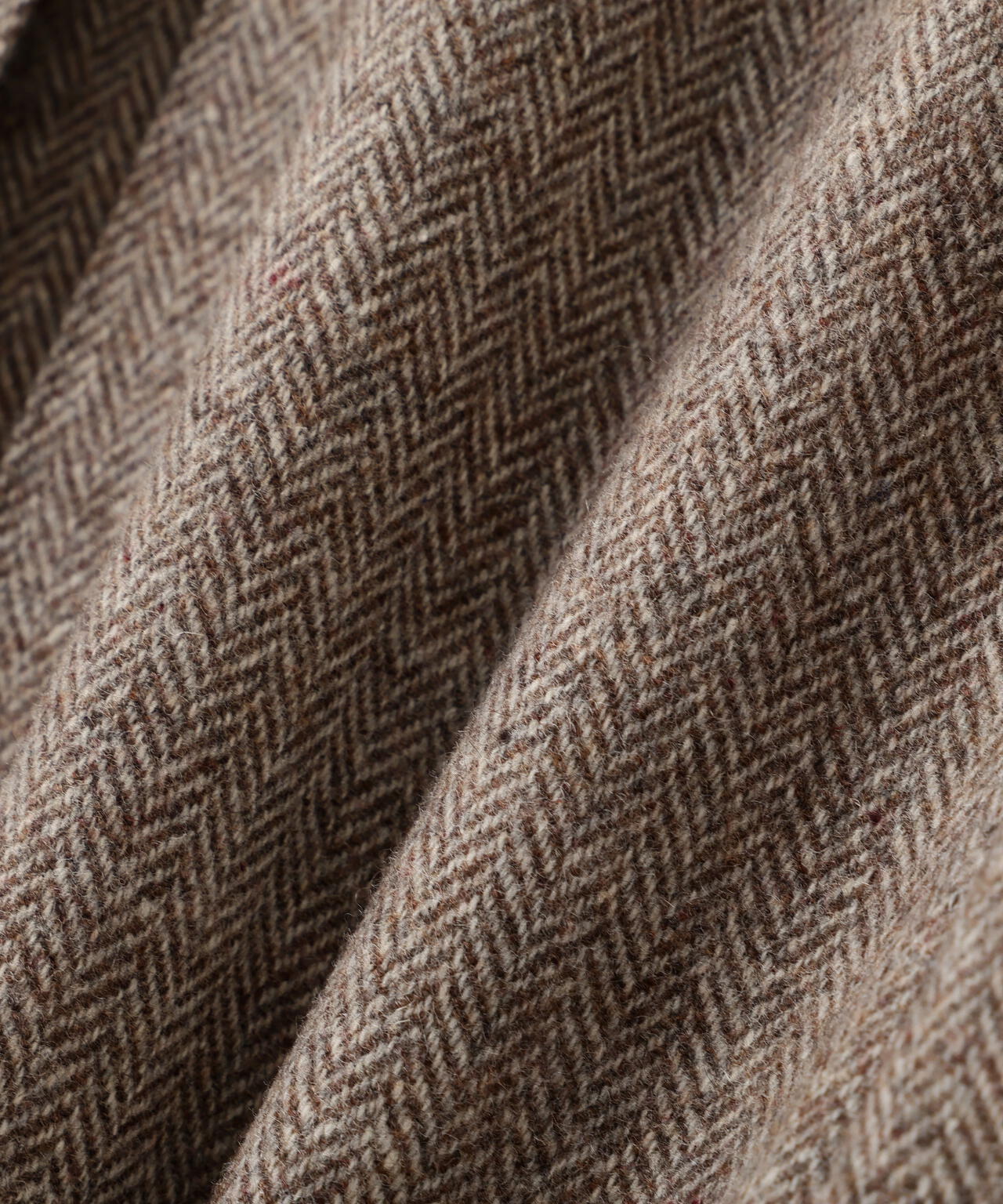 ヘリンボーンツィードタックスカート