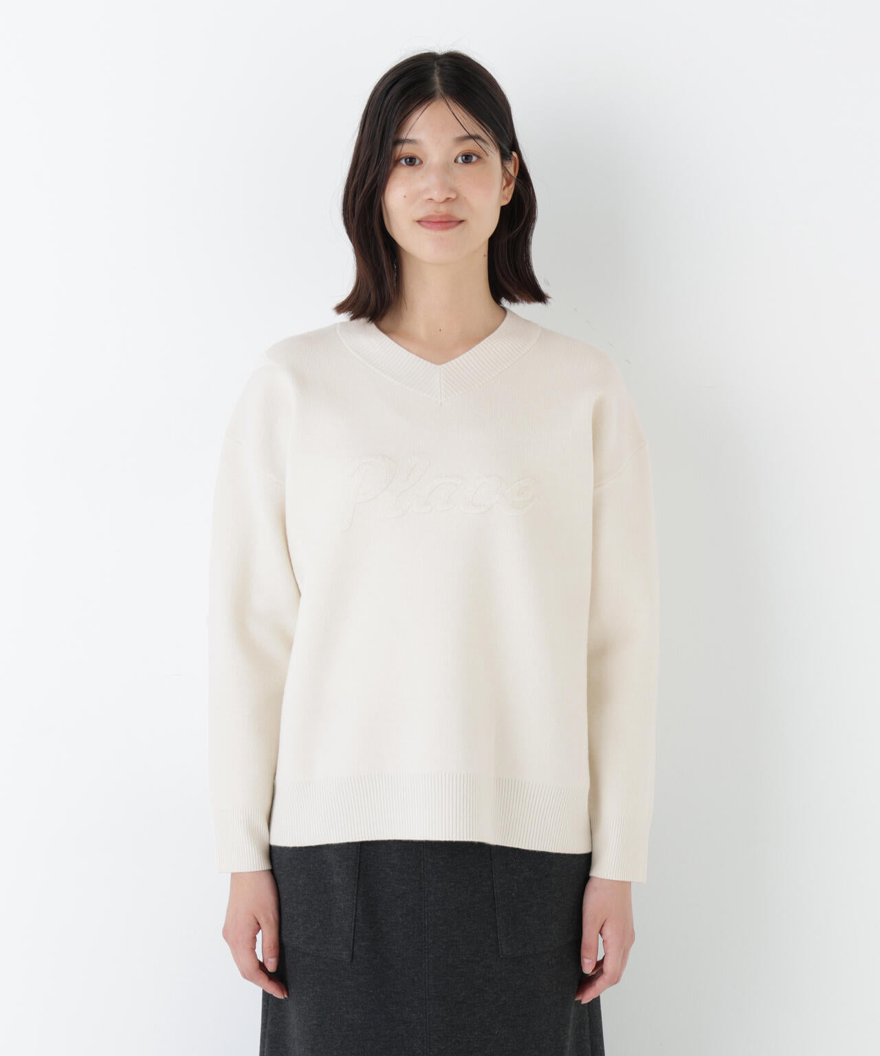 レタードジャガードVネックニット