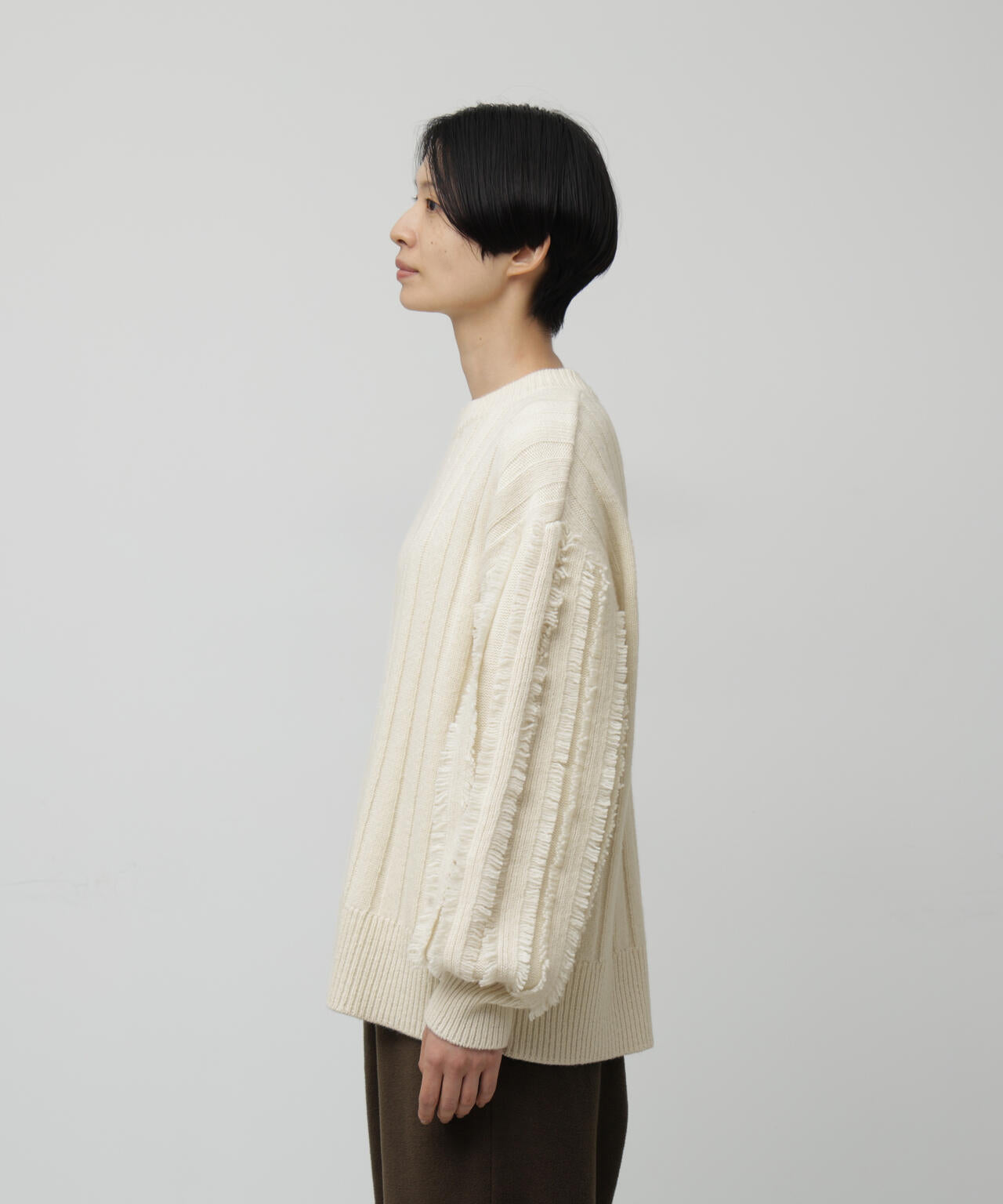 フリンジ袖ニットプルオーバー