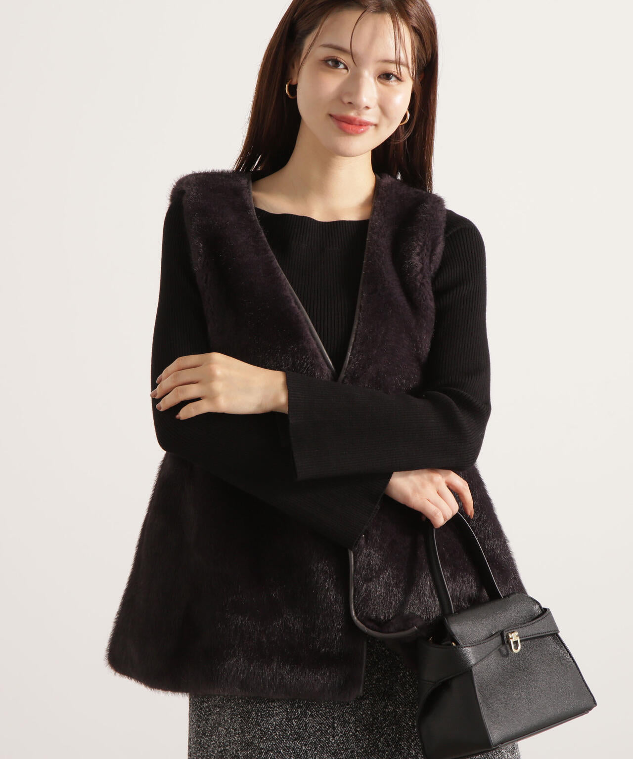 フェイクファーペプラムジレ