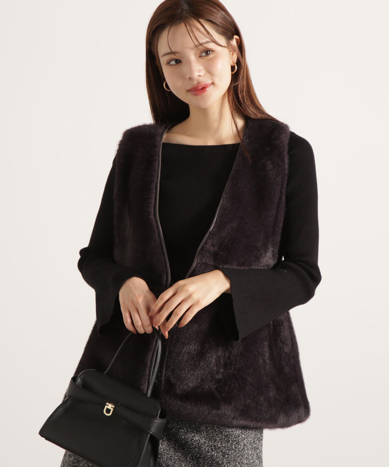 フェイクファーペプラムジレ