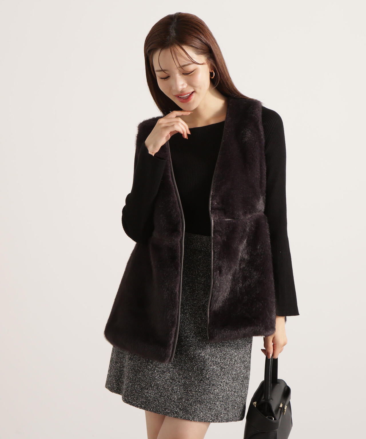 フェイクファーペプラムジレ