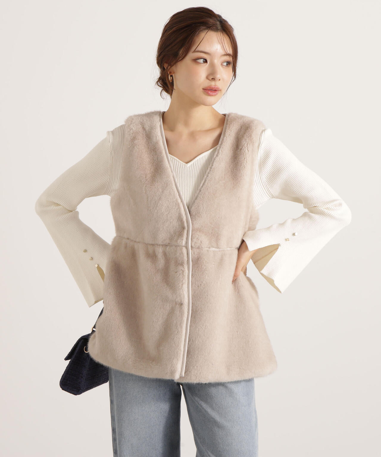 フェイクファーペプラムジレ