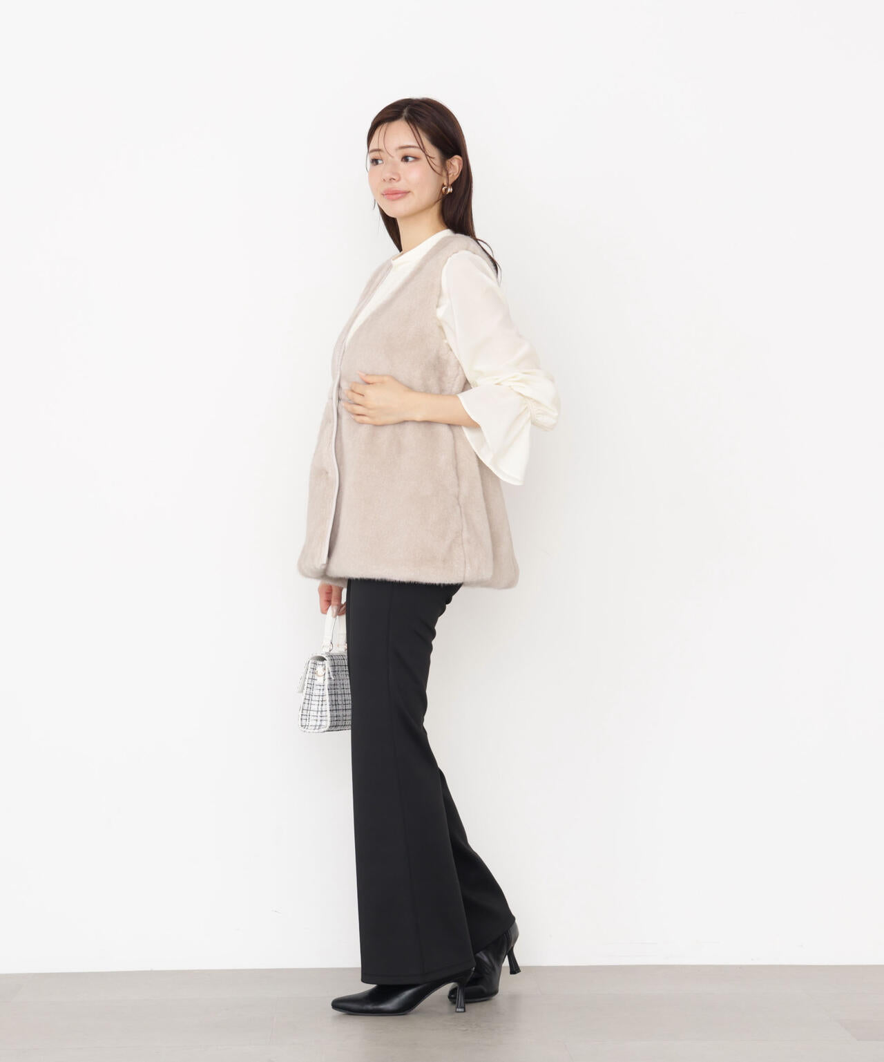 フェイクファーペプラムジレ