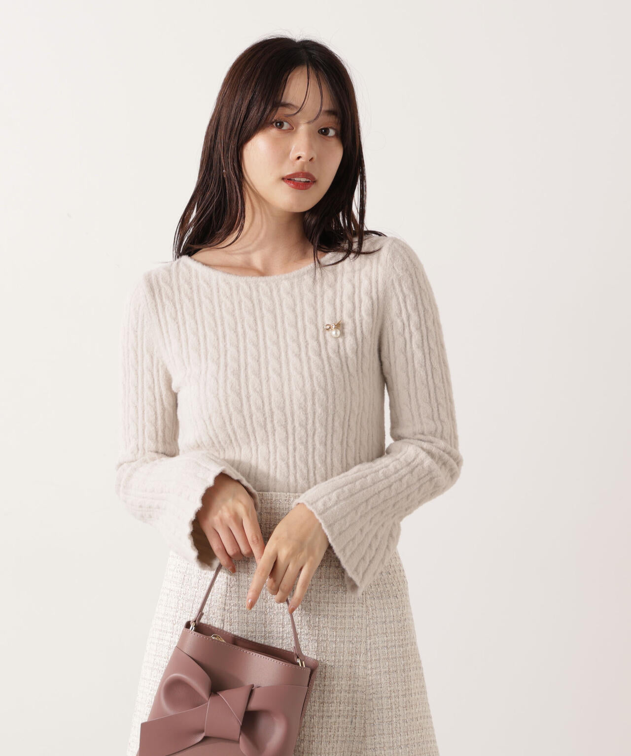 チャーム付きミニケーブルニット