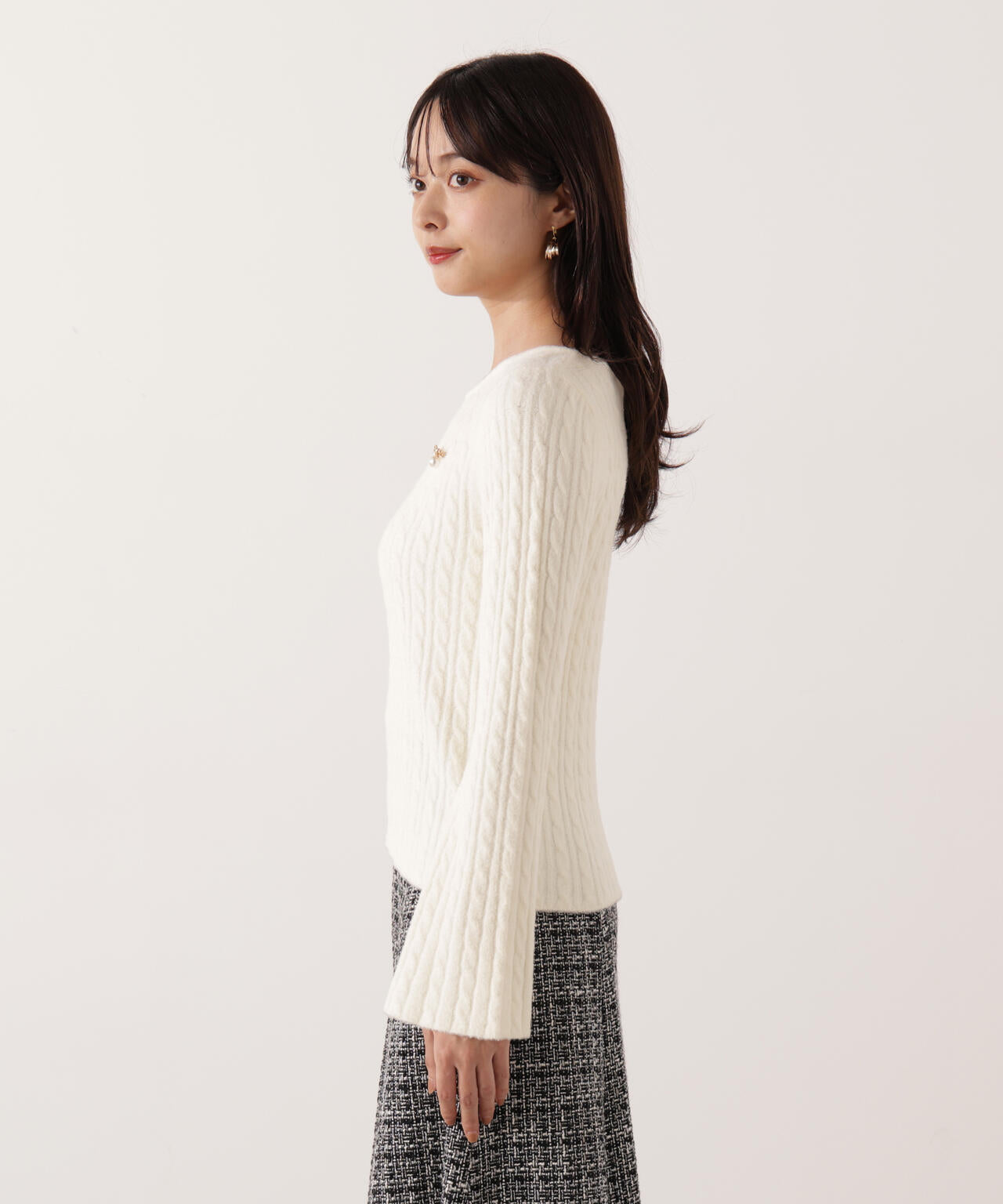 チャーム付きミニケーブルニット