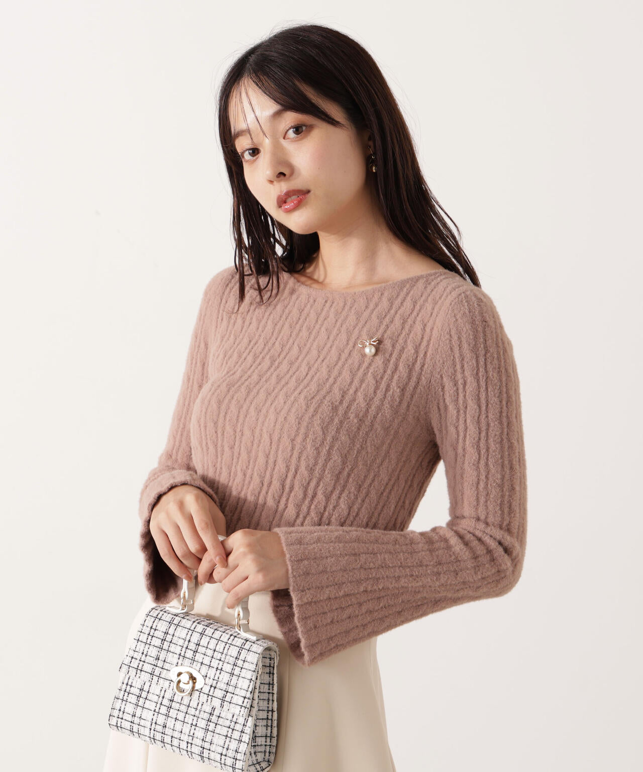 チャーム付きミニケーブルニット