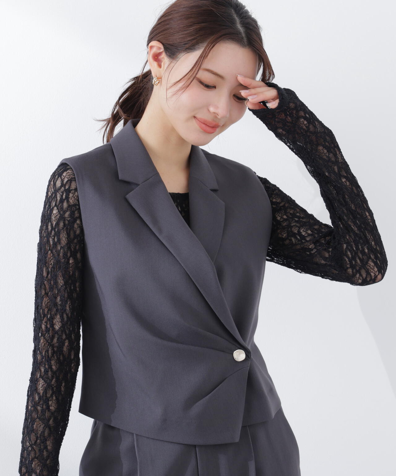 タックアシメジレ