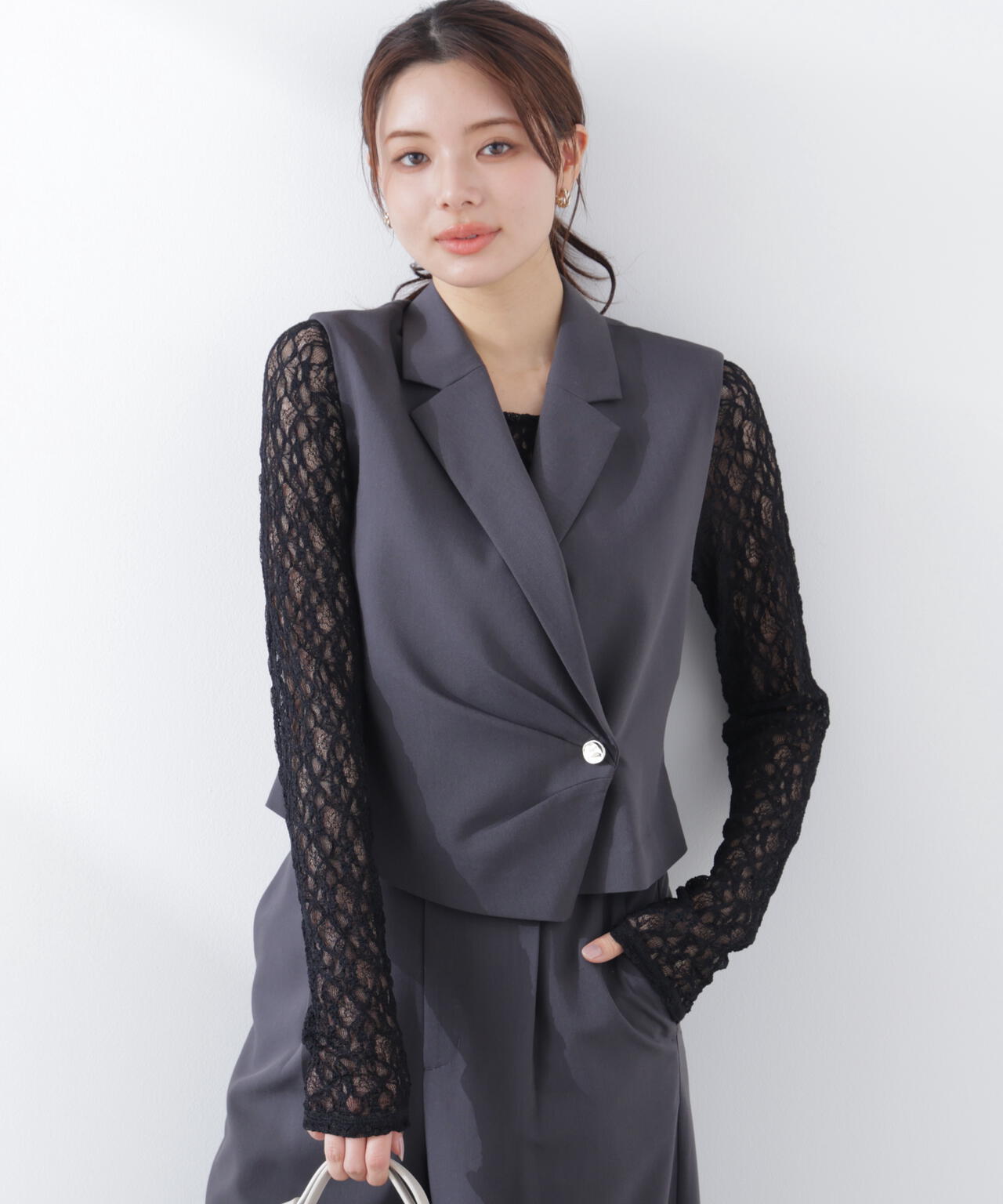 タックアシメジレ