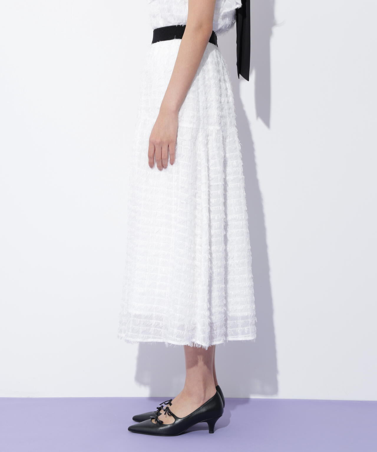 フェザーチェックスカート