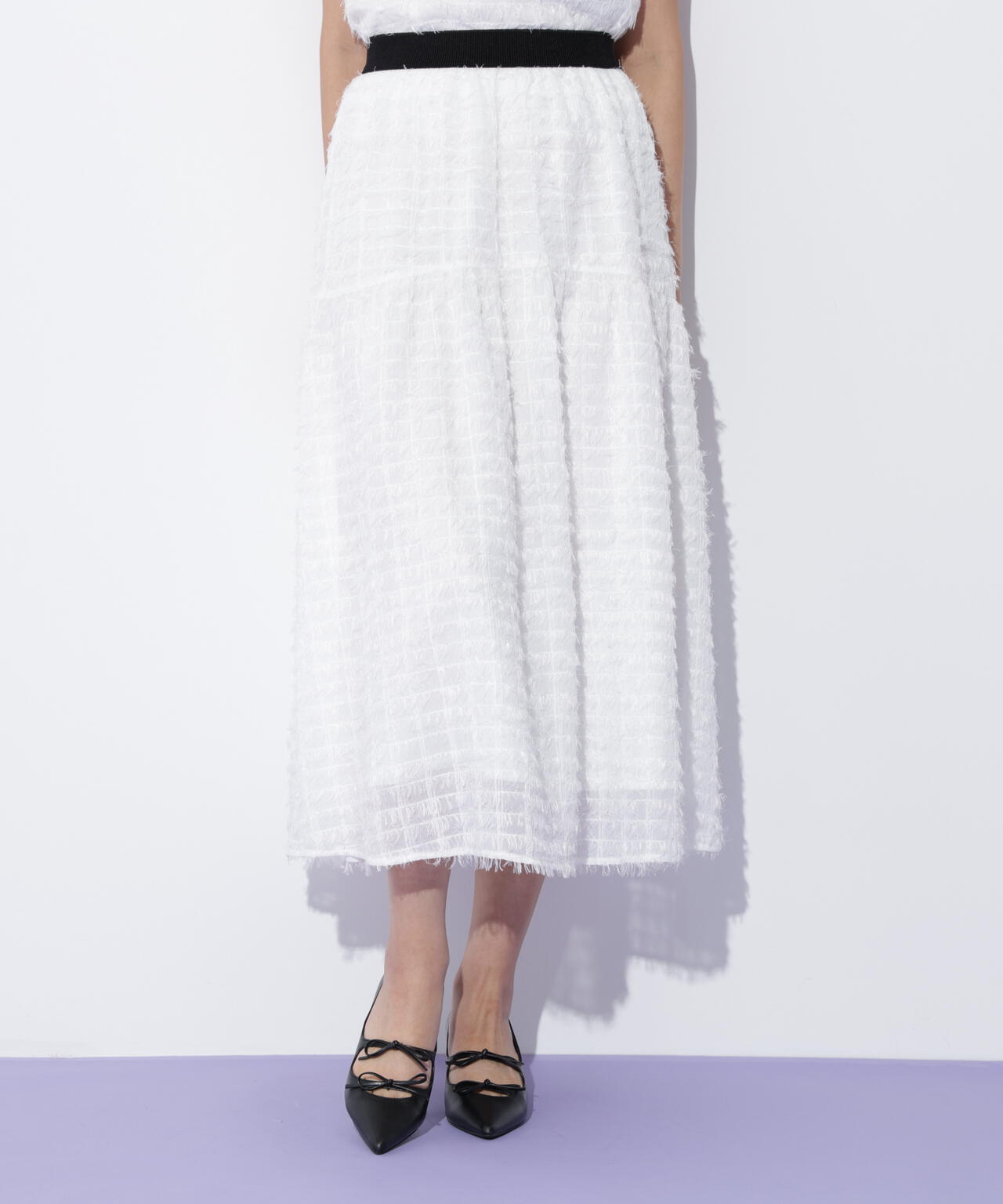 フェザーチェックスカート