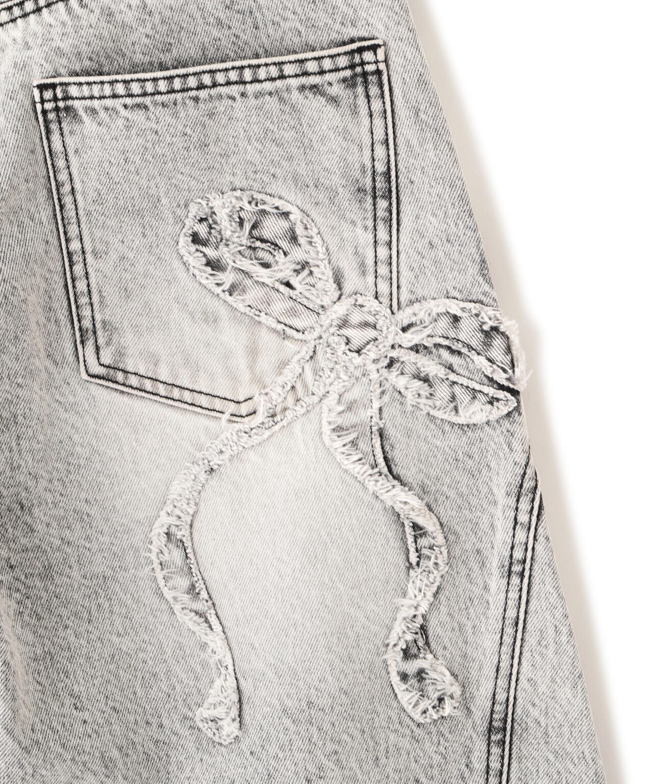 リボン加工カーブパネルデニムパンツ