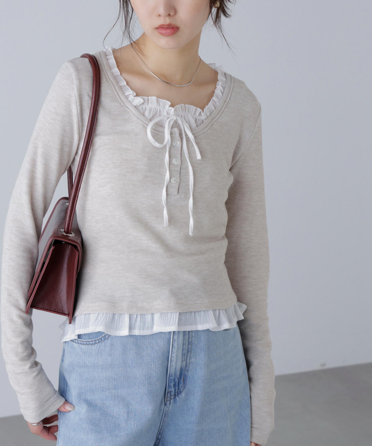 レイヤード風フリルリボンカットソー