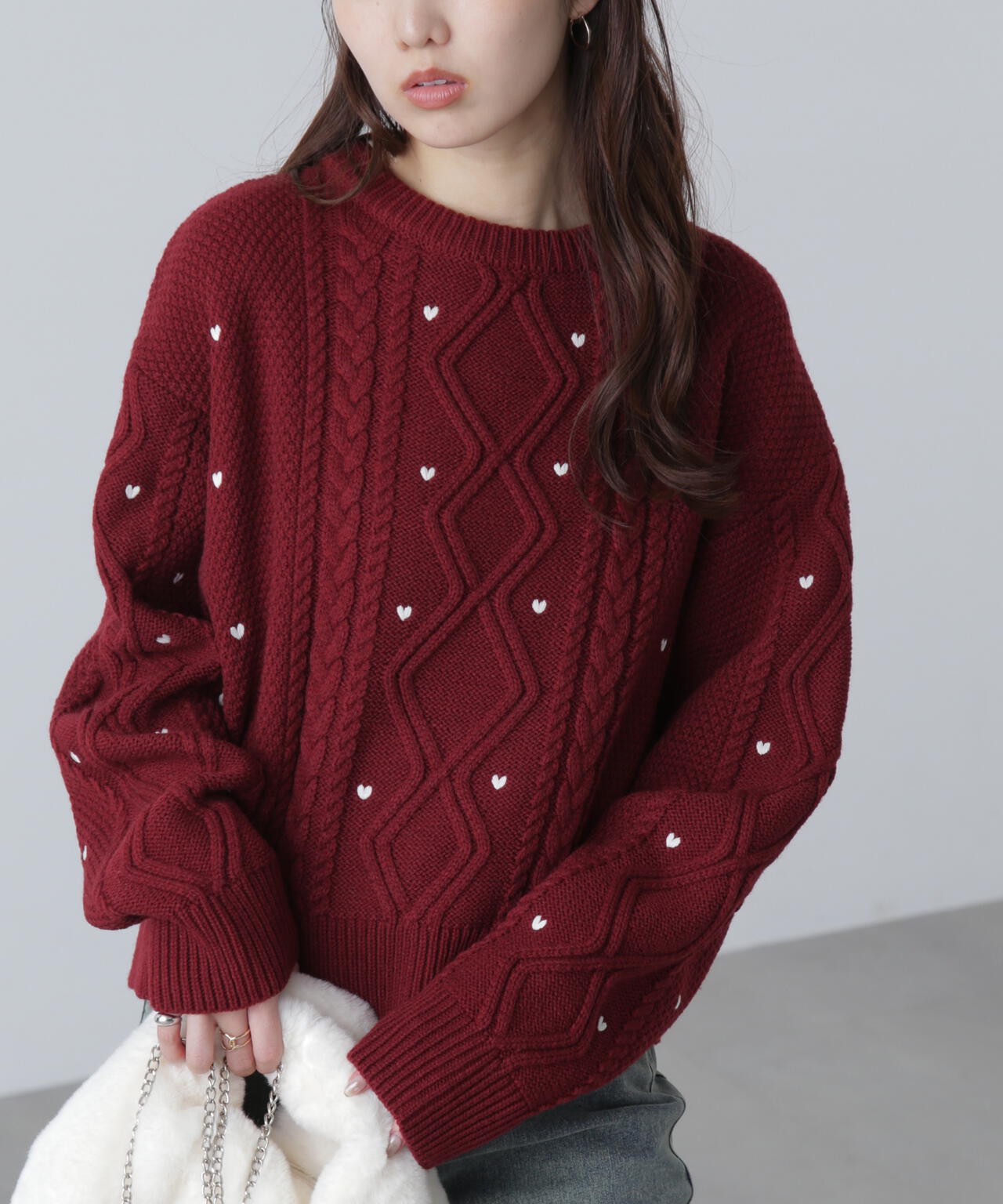 ハート刺繍ケーブルニット