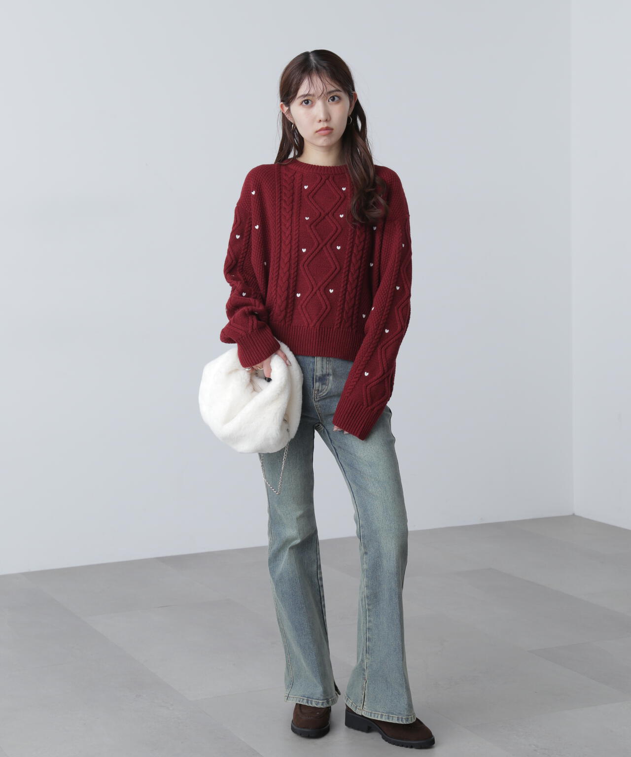 ハート刺繍ケーブルニット