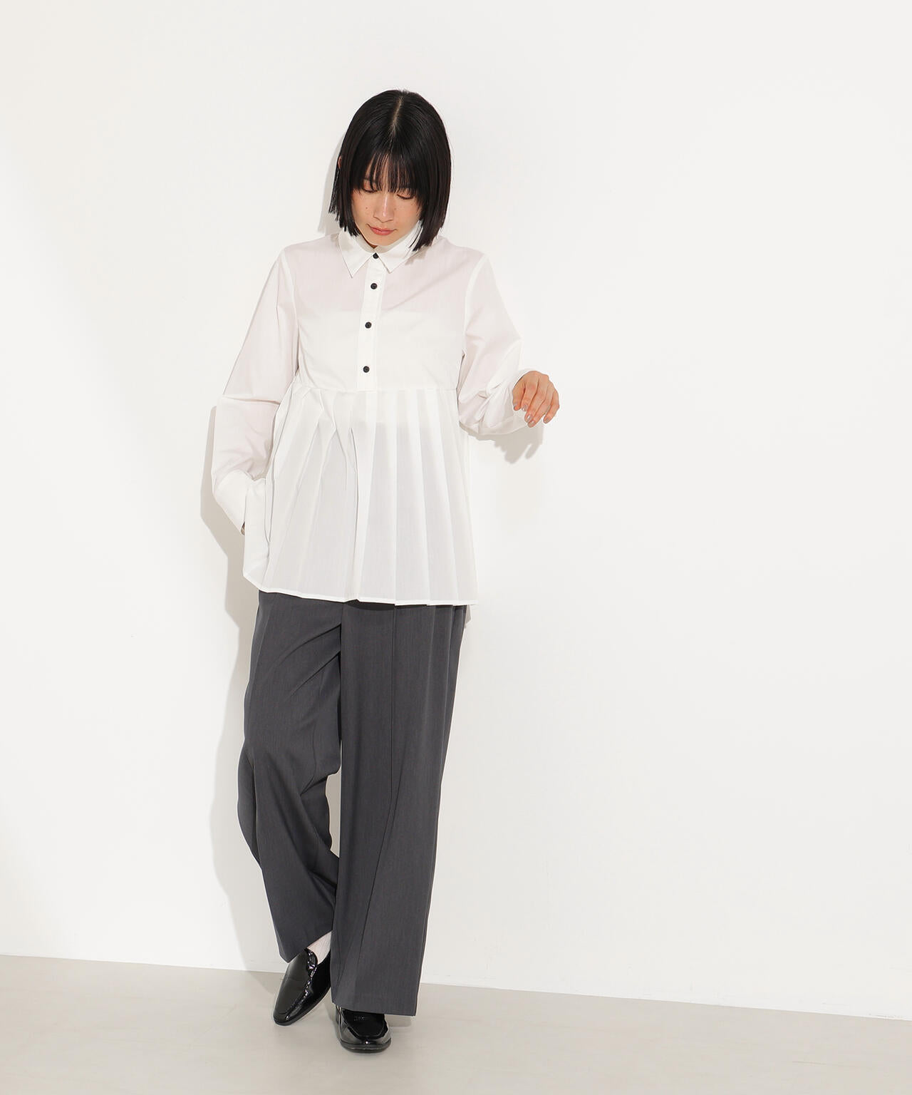 プリーツペプラムブラウス