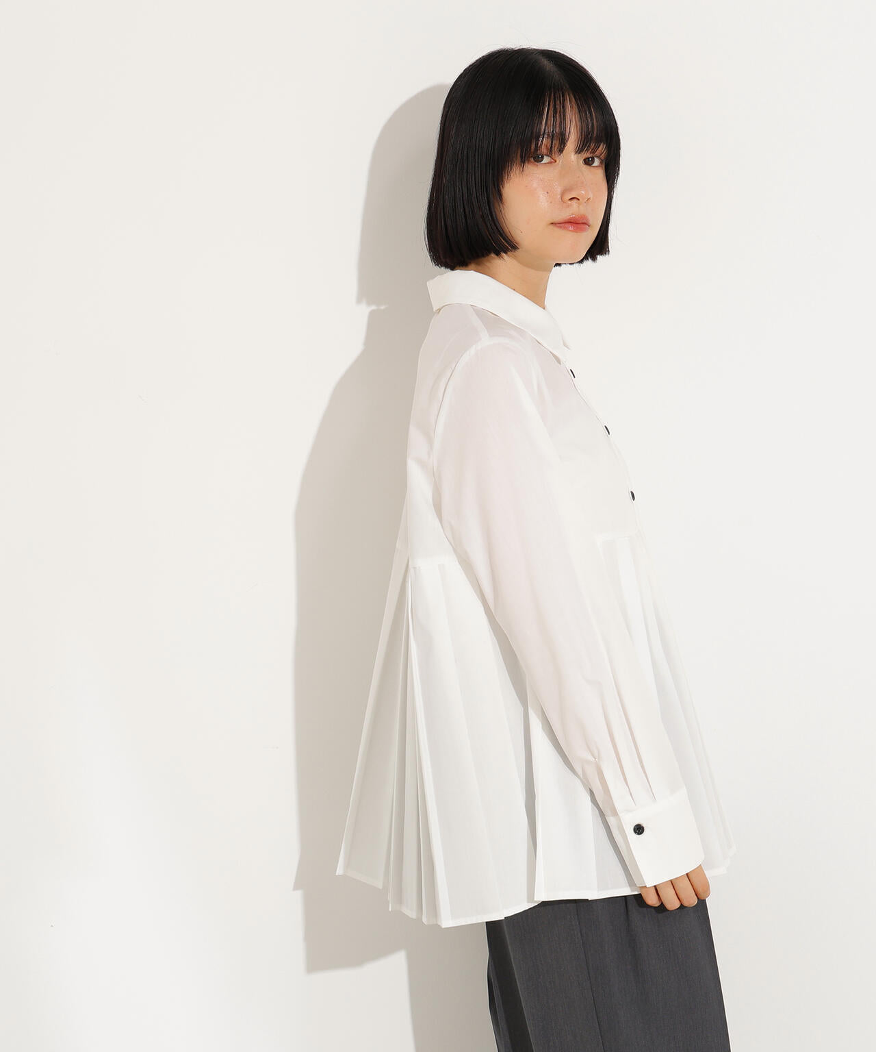 プリーツペプラムブラウス