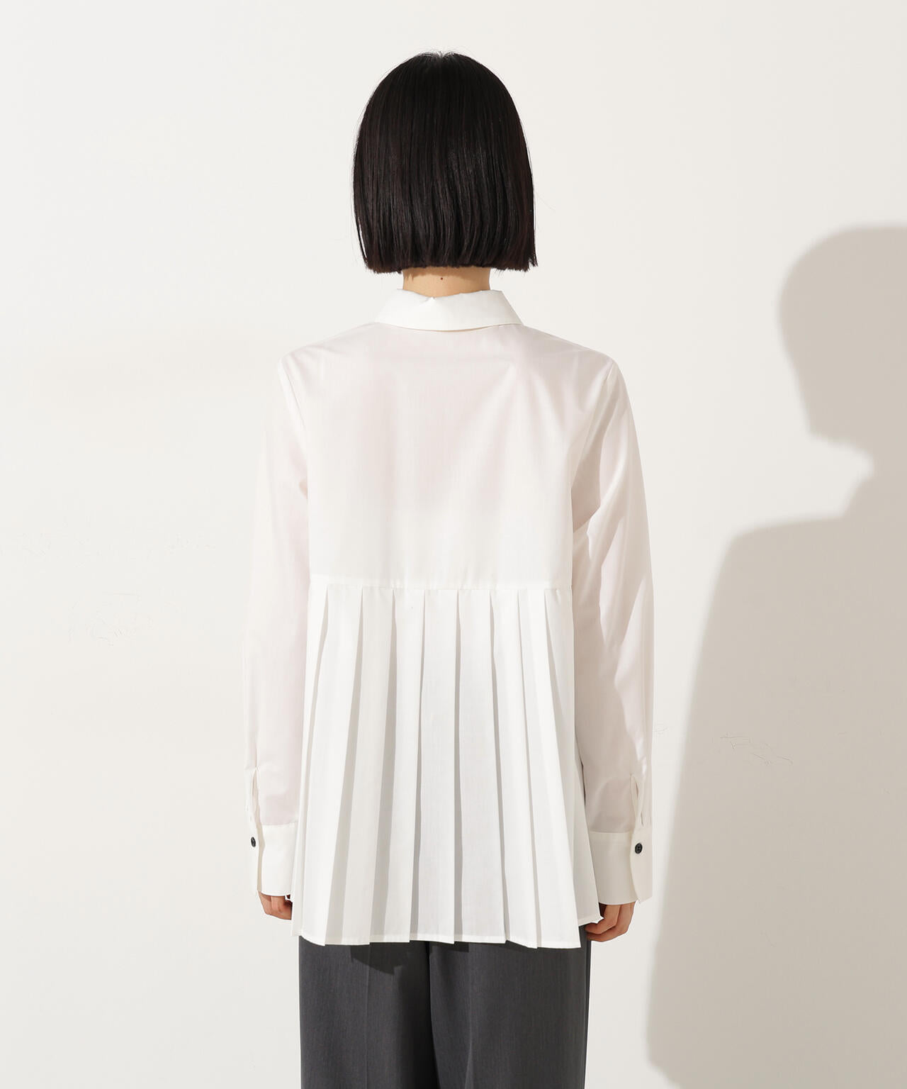 プリーツペプラムブラウス