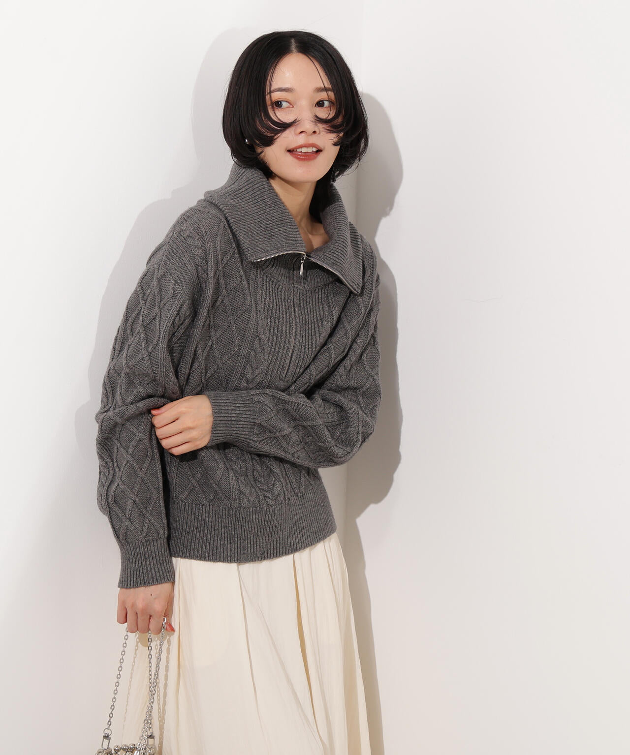 ハーフジップケーブルニット